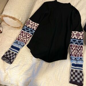 We the free people size medium black with burgandy,cream,blue knit sleeves